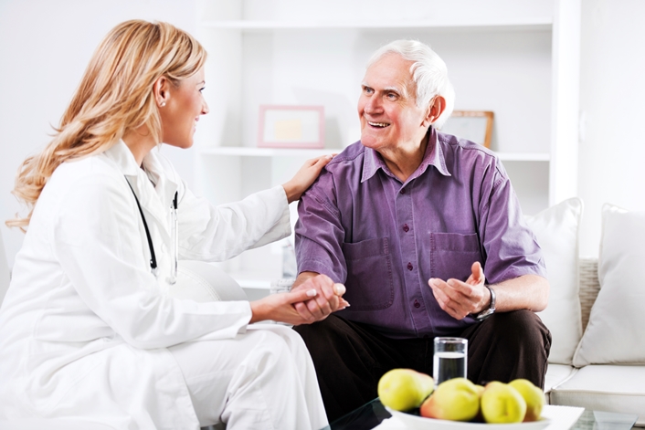 Hearing Health Practioner with Man Patient