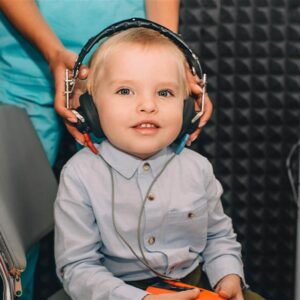 little boy during the hearing exam